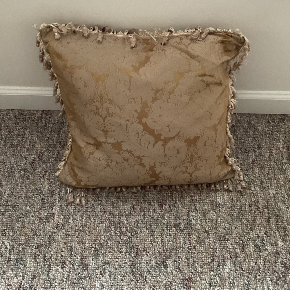 heavy fringe accented trim gold pillow